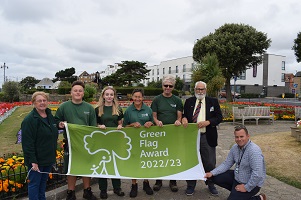 Councillor Michael Talbot with gardening staff and volunteers with the Green Flag at Clacton Seafront Gardens
