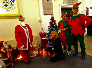 Elves from the Princes Theatre setting the postbox
