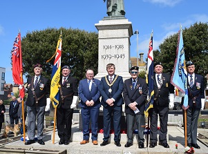 Tendring District Council Chairman Councillor Peter Harris with standard bearers and veterans at Clacton War memorial